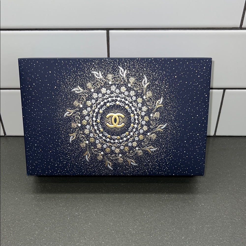 CHANEL Beauty Navy and Gold Decorative make up bag.